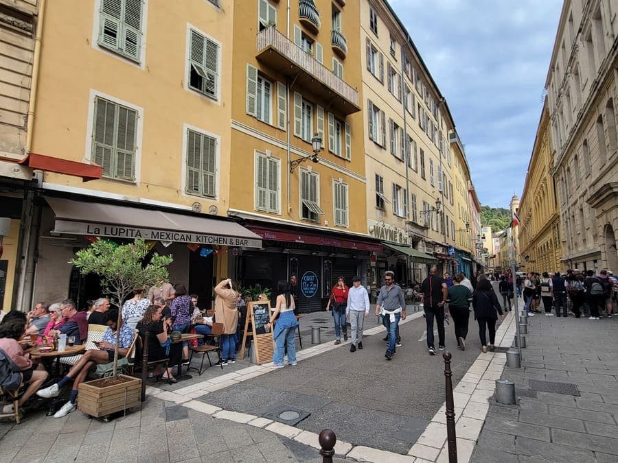 Street in Vieux Nice with different bars and Wayne's
